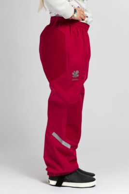Surpantalon Skiddis couleur framboise de côté porté par un enfant